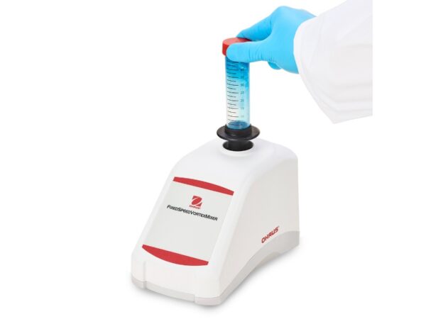 Ohaus vxmnfs vortex mixer with cuphead insert and fixed speed control for laboratory sample mixing. Tube sample being mixed.