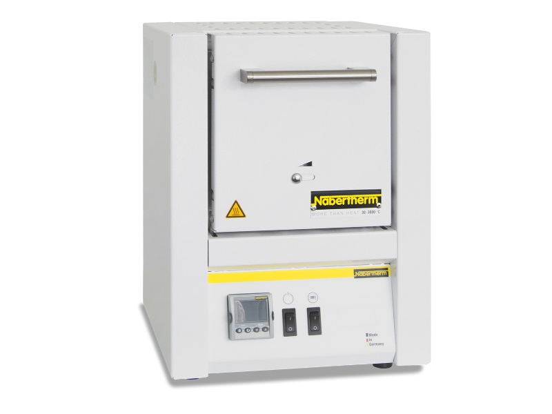 Compact Nabertherm LE 1/11 muffle furnace with closed door and digital control panel for laboratory heating
