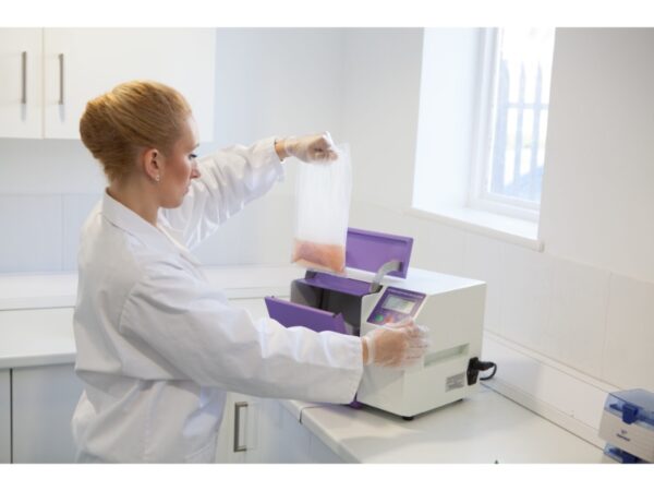 Stomacher 400 Circulator lab blender for efficient and reliable sample homogenization. sample loading by scientist