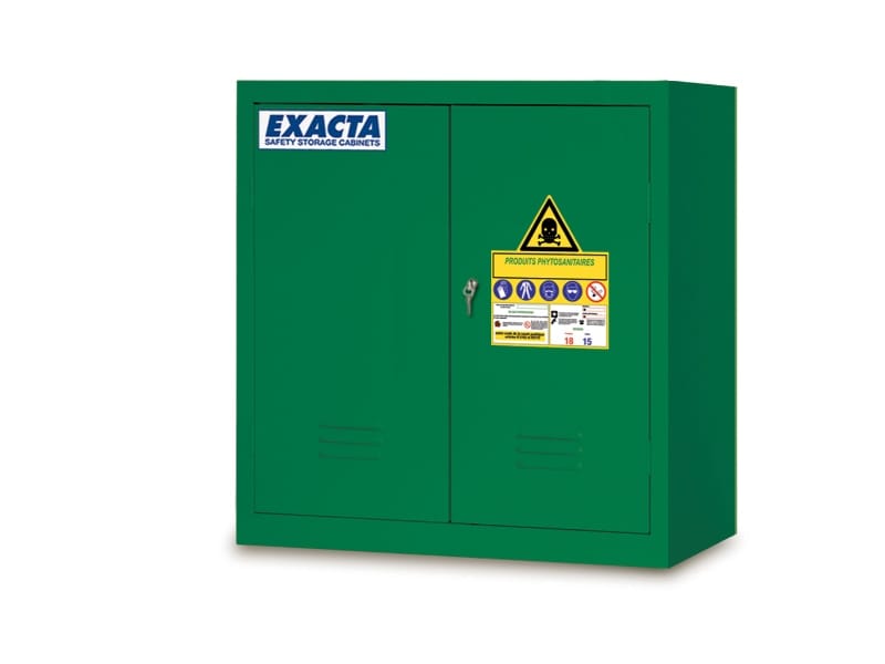 Low-height green Exacta pesticide storage cabinet with double doors and clear phytosanitary warning signage.