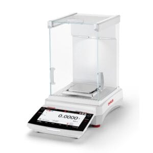 High-precision Ohaus Explorer Plus analytical balance with glass draftshield and motorized leveling system.