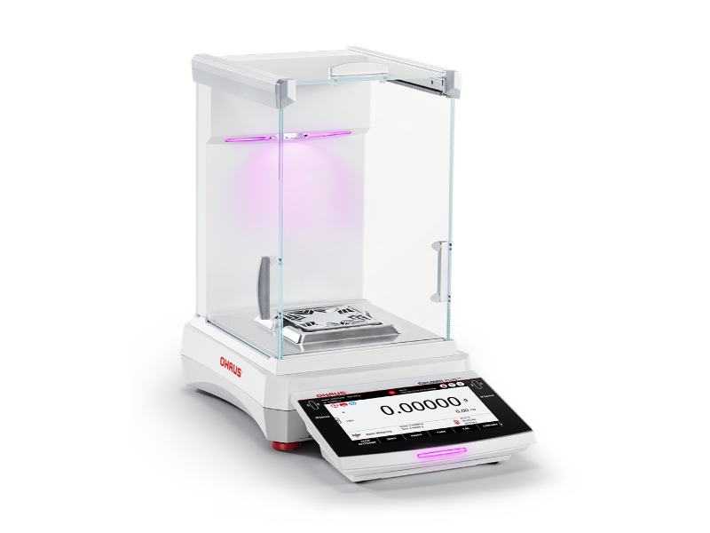 Explorer Plus semi-micro balance from Ohaus with customizable purple draftshield lighting for workflow status indication.